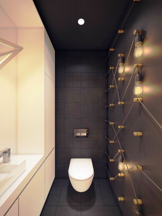 10. Стильная идея оформления туалета с матовыми стенами черного и белого цветов и креативным светильником 